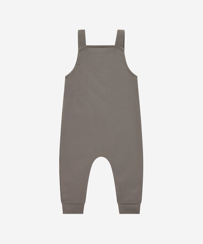 Details: Expertly crafted in a beautiful elephant grey, this Baby Dungaree is the perfect addition to your little one's wardrobe. The push buttons make it easy to open and close, while the pocket adds a stylish touch. Made with comfort and convenience in mind, it's a must-have for any stylish baby.  Color: Grey  Composition : 95% cotton/5% elasthan  