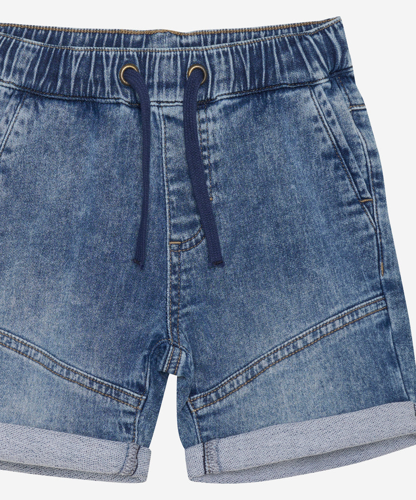 Details: These jogg jeans shorts offer a comfortable and flexible fit with its elastic waistband, while providing practicality with its pockets. Made from high-quality denim, they are perfect for casual wear and will keep you stylish and comfortable all day long.  Color: Blue Night Denim  Composition:  80% Cotton/17% Polyester/3% Elastane  