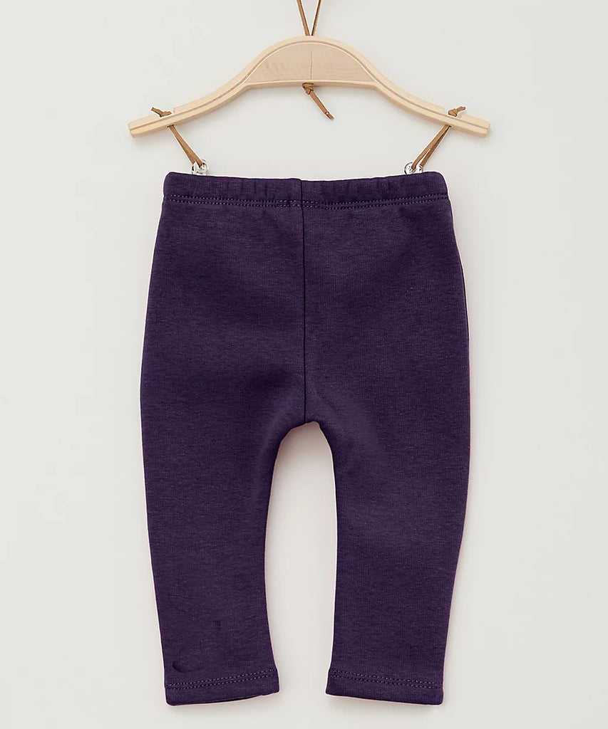 Details:  Baby will be comfortable and cozy with these warm heart leggings. Crafted with fleece lining and an elasticated waistband, these leggings provide a snug and secure fit, making them perfect for keeping little ones warm in cooler months.  Color: Dark purple  Composition:  066%PES 030%CO 004%EL  