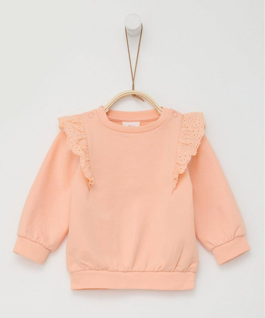 Details:  Expertly designed for your little one, our Baby Frill Sweatshirt is the perfect addition to their wardrobe. The apricot orange color adds a pop of brightness, while the frills on the sweater provide a touch of elegance. With a round neckline and ribbed arm cuffs and waistband, this sweatshirt ensures a comfortable and stylish fit.  Color: Apricot  Composition: 095%CO 005%EL   