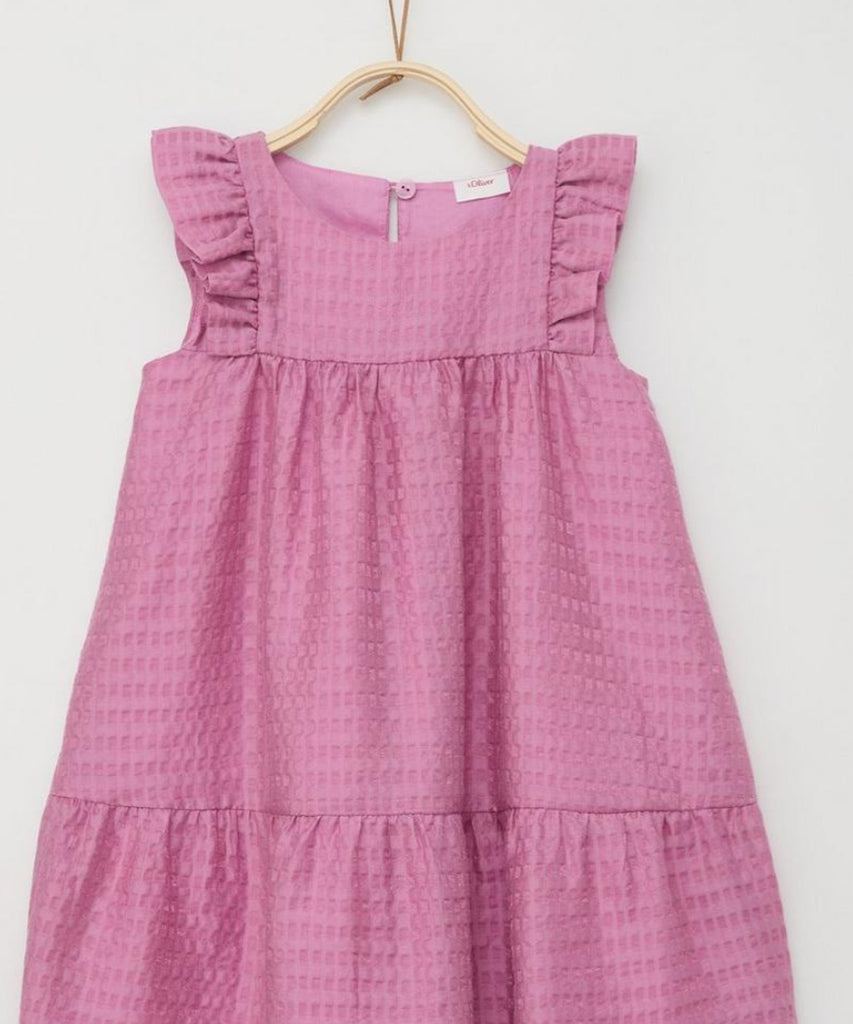 Details:  This girls' a-line dress in dark rose features whimsical frills and a versatile button-back closure. Its playful design is perfect for any occasion, while providing a secure and comfortable fit. Elevate her wardrobe with this charming and functional piece.  Color: Dark rose  Composition:  073%CLY 027%PA 