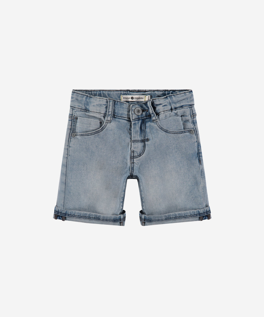 Details: Expertly crafted with a medium blue washed denim, these jogg jeans shorts are perfect for any occasion. Featuring a convenient button and zip closure, as well as belt loops and adjustable elastic on the inside, these shorts provide both style and comfort. Complete with practical pockets, these shorts are a must-have for any wardrobe.  Color: Medium blue washed denim  Composition: 62% cotton/23% polyester/13% rayon/2% elasthan 