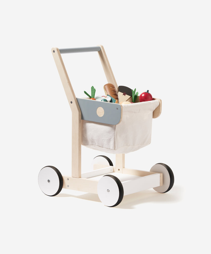 Kid's Concept  A wooden shopping trolley with 100% cotton storage. A great role play toy that encourages mobility and is the perfect addition to any child’s play shop. Use both the upper basket and lower tray to collect groceries as you wander the isles!  Age: 2y+  Size: 36 x 28.5 x 50cm