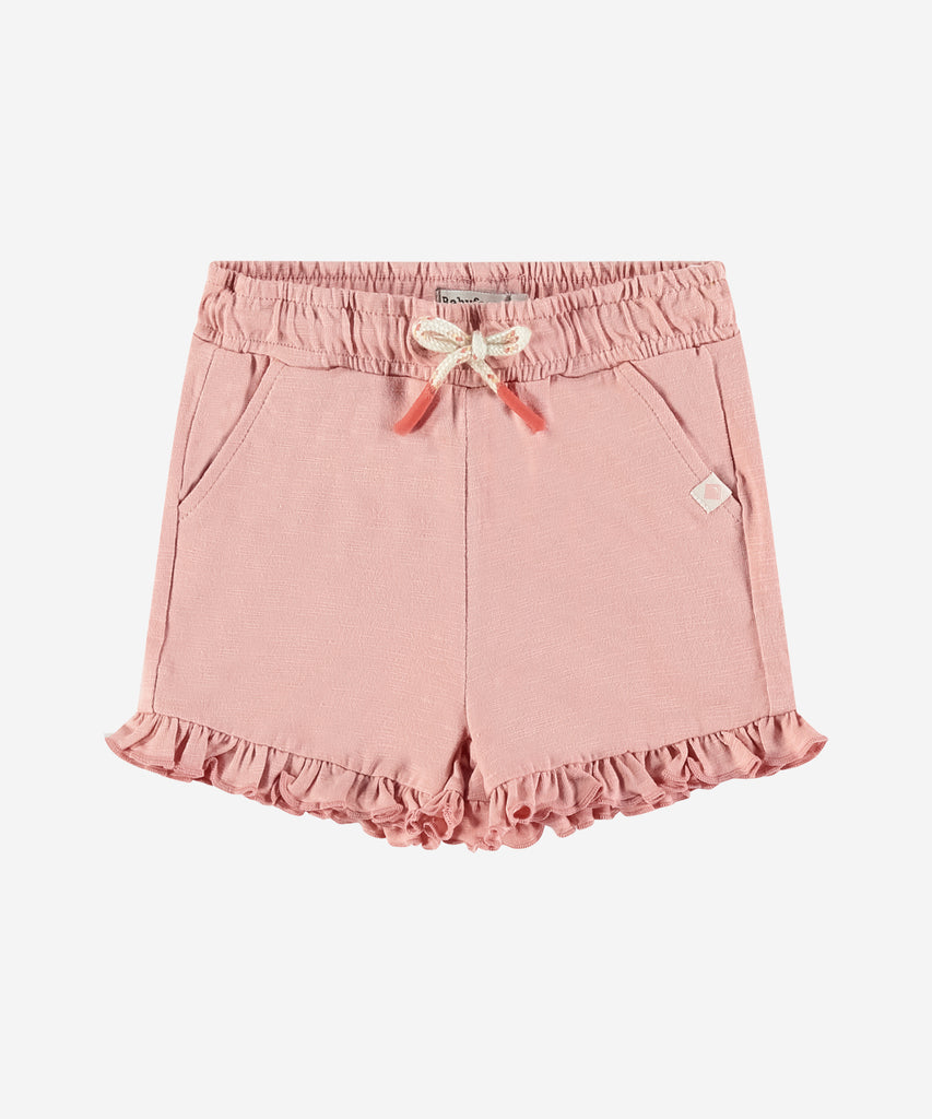 <strong>Details: </strong>Expertly designed for your little one, these adorable Baby Ruffle Shorts in Pink are a must-have for any parent. The soft and comfortable fabric, coupled with the delicate ruffles and elastic waistband, make these shorts both stylish and practical. Perfect for playtime or a day out, your baby will look and feel great in these shorts.&nbsp;<br><strong></strong><strong></strong><strong>Color</strong>: Pink&nbsp;<br><strong>Composition</strong>: Summer 24 &nbsp;
