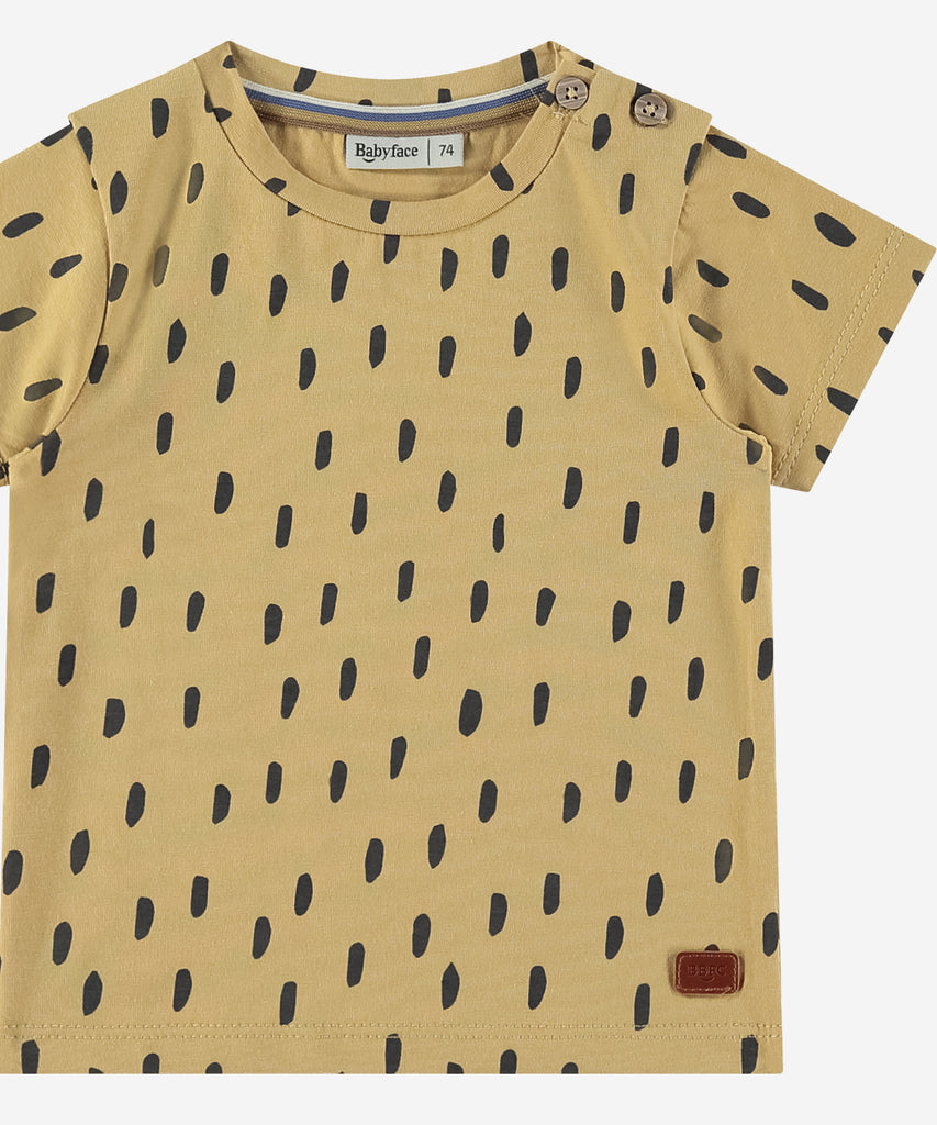 <strong>Details: </strong>Introduce your little one to comfort and style with our Baby T-Shirt AOP Dots Ochre. Made with short sleeves and a round neckline, this t-shirt features a playful all over print of dots. Give your baby the best of both worlds in one adorable package. Buttons on the side for easy ddressing.&nbsp;&nbsp;<br><strong>Color</strong>: Ochre&nbsp;<br><strong>Composition</strong>: &nbsp;95% cotton/5% elasthan &nbsp;