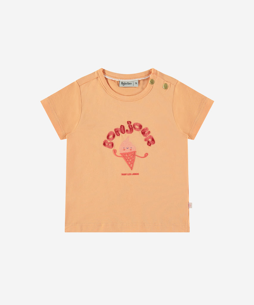 <strong>Details: </strong>This baby t-shirt features a charming bonjour ice cream print on the front, adding a touch of sweetness to any outfit. The rounded neckline provides comfort and ease for your little one. Give your baby a cute and stylish look with this bonjour cantaloupe t-shirt. Buttons on the side for easy dressing.&nbsp;&nbsp;<br><strong>Color</strong>: Cantaloupe<br><strong>Composition</strong>: &nbsp;95% cotton/5% elasthan &nbsp;
