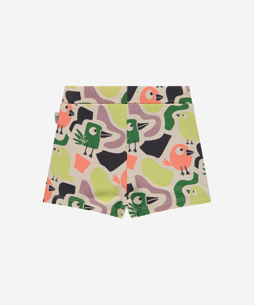 Details:  Introducing the soft Jogg Shorts all over print birds, designed for your little one's comfort. Crafted from a soft and durable fabric, these shorts feature an elastic waistband for a secure and comfortable fit.  Ensure your child's adventures are as comfortable as can be with these Shorts.  Color: Cream  Composition: 95% BCI cotton/5% elasthan  