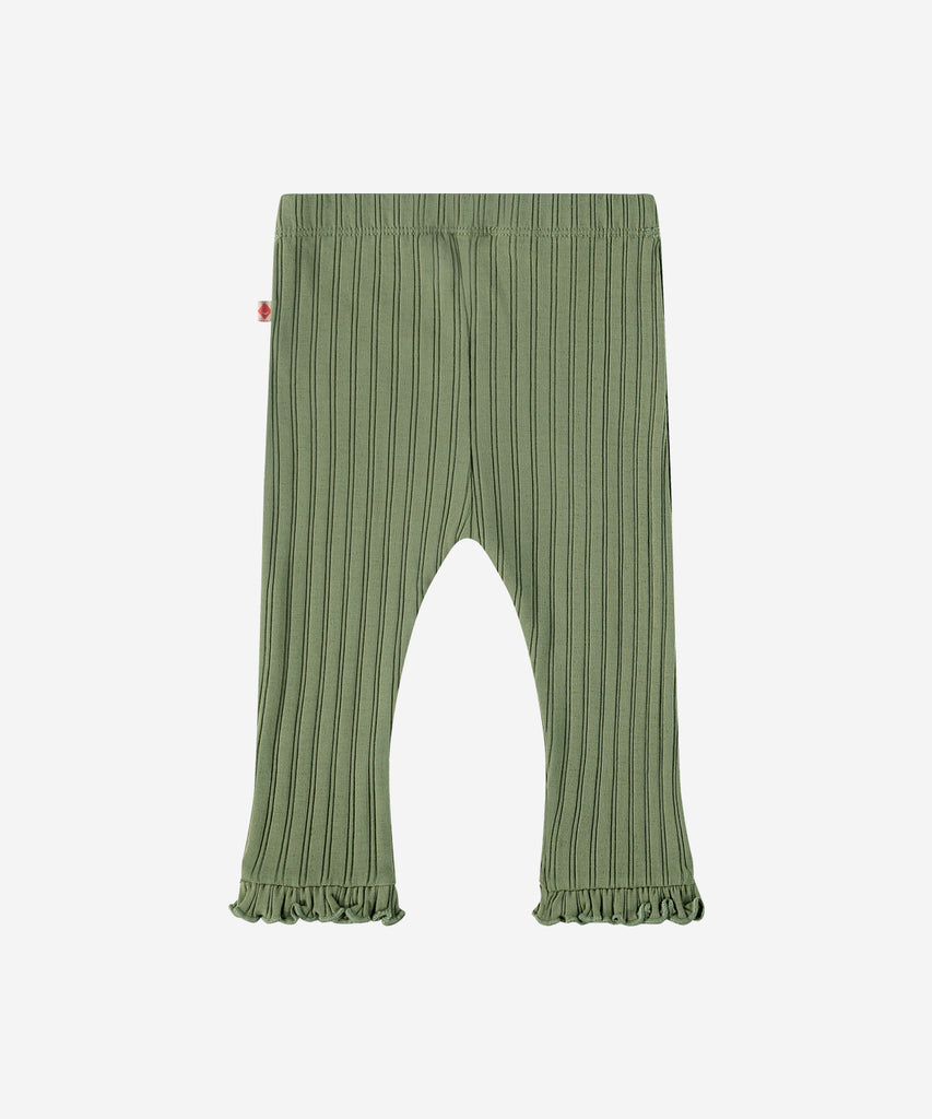 Details: "Made with soft ribbed fabric, our Baby Rib Leggings in moss green provide comfort and flexibility for your little one. The elastic waistband ensures a secure fit, while the frill detailing adds a playful touch. Perfect for everyday wear or special occasions."   Color: Moss green  Composition: 95% BCI cotton/5% elasthan  