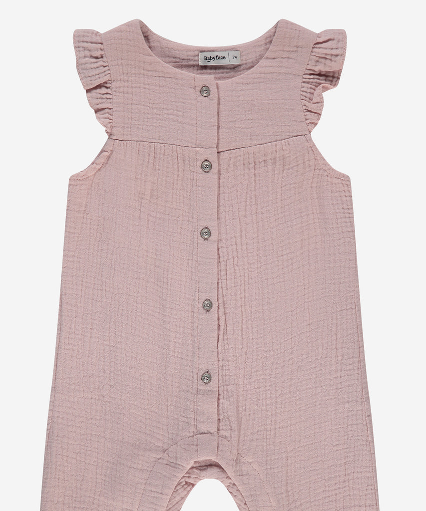 Details: Expertly crafted for your little one, this Baby Sleveless Muslin Suit in Blush offers ultimate comfort and style. The breathable muslin material, button closure, and sleeveless design make it perfect for warm weather, while the round neckline adds a touch of elegance. Keep your baby cool and stylish all day long.   Color: Blush  Composition : Summer 2024  