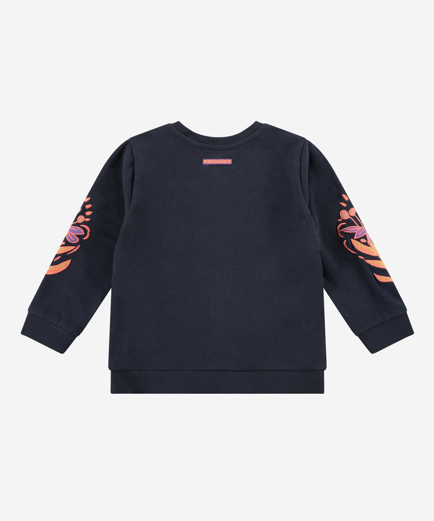 This stylish sweatshirt is perfect for young girls. With its beautiful embroidered flowers on the sleeves, it is sure to be a favorite. Crafted with a comfortable blend of materials, it features a ribbed waistband and arm cuffs to provide a perfect fit. This sweatshirt is sure to become a favorite in any kid's closet. Up to size 92, easy opening with 2 push buttons on the back. Round Neckline.   Color: Dark blue  Composition: 95% BCI cotton/5% elasthan 