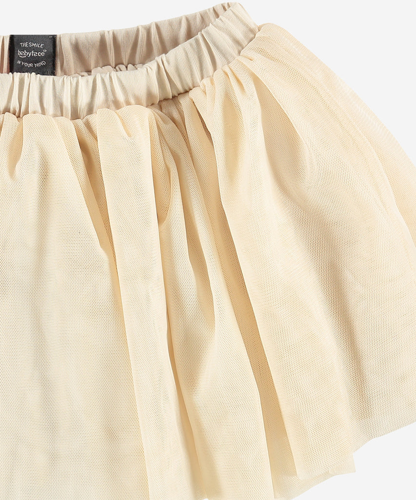 Details: This tulle skirt is perfect for any special occasion. Made from soft tulle fabric, the skirt features an elasticated waistband to ensure a perfect fit. Its lace detailing adds a touch of whimsy and romance.  Color: Stone  Composition: 100% polyester 