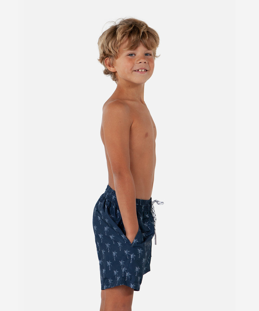 <strong>Details: </strong>Splash into fun with our Bernardou Swim Shorts in navy blue! Featuring an elastic waistband for ultimate comfort and an all over print of playful palm trees, these shorts are perfect for any young adventurer ready to hit the pool or beach. Dive in now!&nbsp;<br><strong></strong><span data-mce-fragment="1"></span><strong>Color:</strong> Navy blue&nbsp;<br><strong>Composition:</strong> 100% Polyester &nbsp;