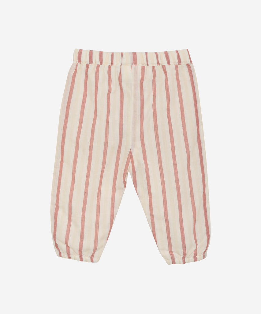 Details: Introducing our Baby Woven Pocket Pants YD Stripe Eggnog. These pants offer both style and functionality with their classic stripes and convenient pocket design. The elastic waistband ensures a comfortable fit for your little one. Perfect for any occasion, these pants are a must-have for your baby's wardrobe.  Color: Eggnog  Composition:  Organic Woven Yarndyed 100% Cotton  