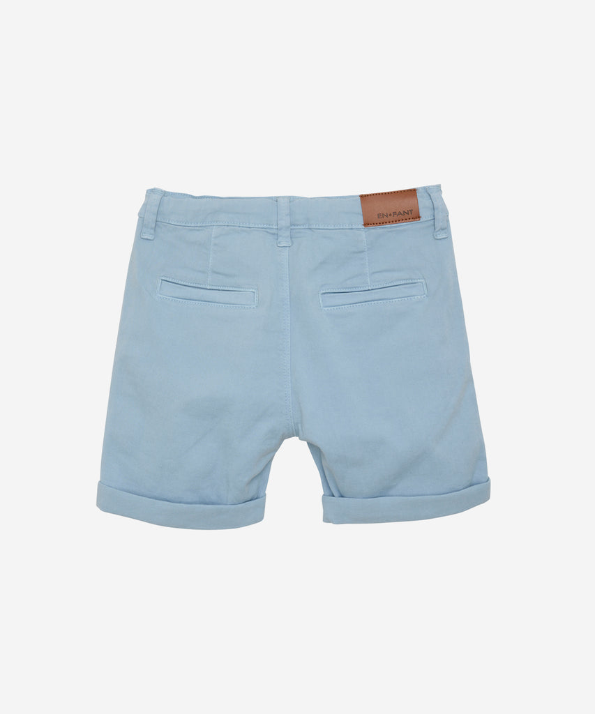 Details:  Expertly crafted from durable canvas material, these dusty blue shorts are the perfect addition to your summer wardrobe. With convenient pockets, sturdy belt loops, and a secure button and zip closure, these shorts offer both style and functionality. Stay comfortable and stylish all season long with these canvas shorts.  Color: Dusty blue  Composition: 98% Cotton/ 2% Elastane 