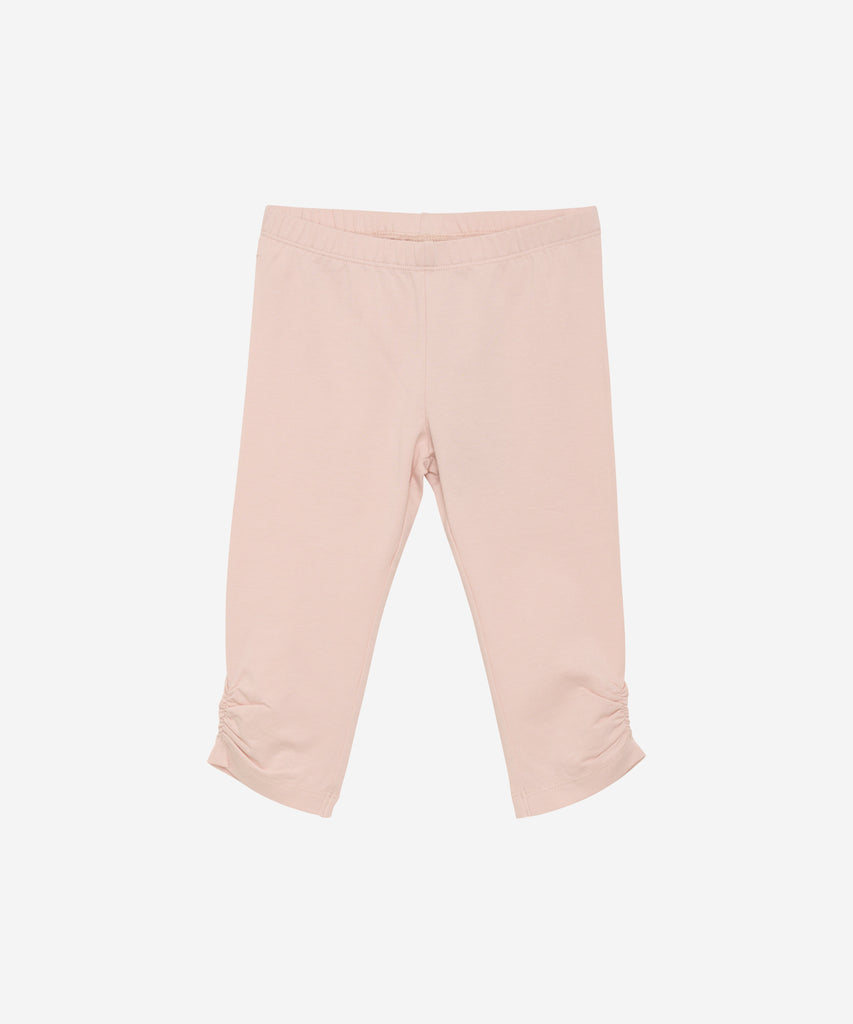 Details:  These 3/4 leggings in peach offer both comfort and style with its elastic waistband. Perfect for any activity, these leggings will keep you feeling supported and looking trendy.  Color: Peach whip  Composition:  Organic Single Jersey 95% Cotton/ 5% Elastane 