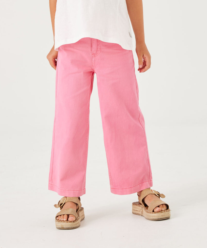 Details:  These girls canvas pants in intense pink offer both comfort and style. With a wide leg design and convenient pockets, these pants provide easy movement and ample storage. The button and zip closure, along with belt loops, ensure a secure fit. Plus, the adjustable elastic on the inside offers a customized fit. Perfect for any young fashionista.Elevate your wardrobe with these statement pants."    Color: Intense pink  Composition: 100% Cotton  