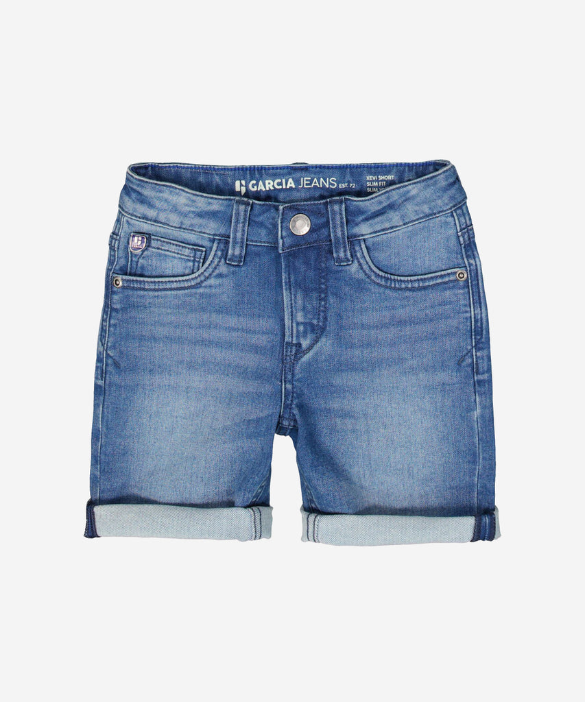 Details: Expertly crafted Xevi jeans shorts are a must-have for any wardrobe. The medium used blue denim offers a versatile look, while the button and zip closure provide a secure fit. With the addition of belt loops, these shorts are both stylish and functional. Perfect for any casual or trendy outfit. Ajustable elastic on the inside.   Color: Medium used blue  Composition:  69% Cotton, 25% Polyester, 4% Recycled Cotton, 2% Elasthan  