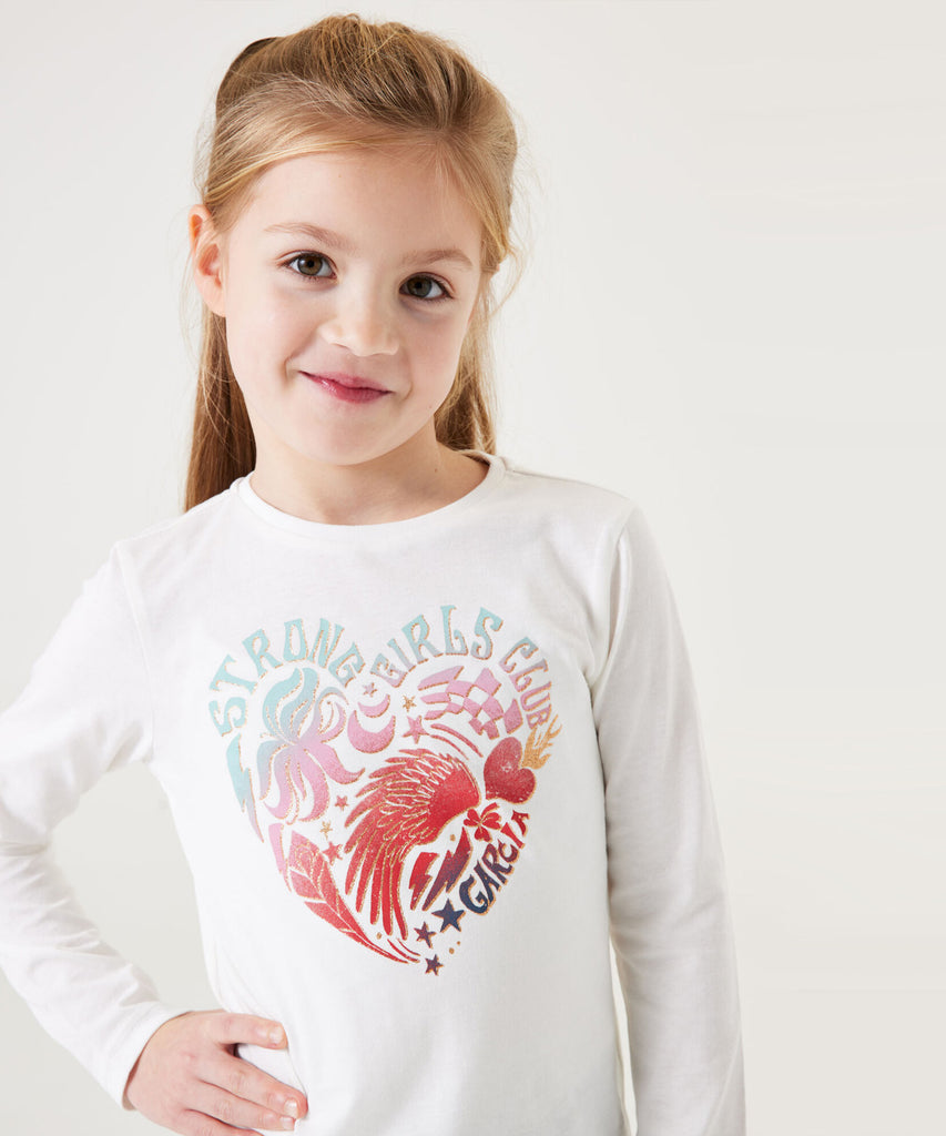 Details: &nbsp;Stay stylish and comfortable with our LS T-Shirt Heart in Off White. This long sleeve t-shirt features a round neckline and an adorable Heart print on the front. Perfect for everyday wear, add a touch of cuteness to your wardrobe. &nbsp;&nbsp; Color:&nbsp; Off white&nbsp; Composition:&nbsp; 100% Cotton&nbsp;