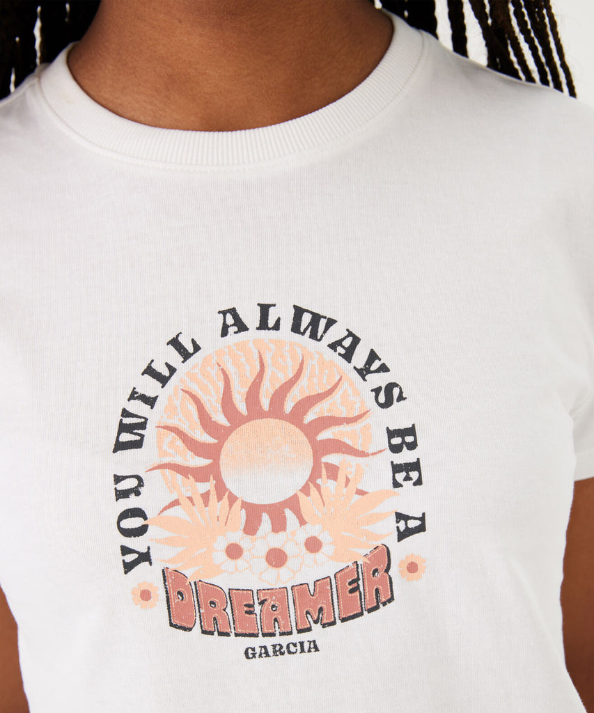 Details: This off-white t-shirt is a stylish and comfortable choice for anyone who loves to embrace their inner dreamer. Featuring a round neckline and short sleeves, this t-shirt also includes the inspiring text, "you will always be a dreamer," printed on the front. Made for the confident and ambitious, this t-shirt is perfect for everyday wear.  Color: Off white  Composition:  100% Cotton  