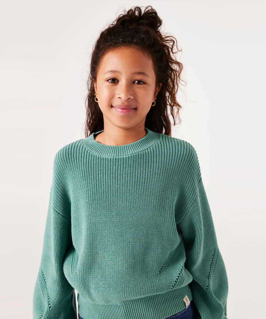 Details: ﻿"Expertly crafted with a knitted rib design, this Beryl Green pullover exudes effortless style. The round neckline adds a touch of elegance, while the ribbed arm cuffs and waistband provide a comfortable fit. Elevate your wardrobe with this versatile and on-trend piece."   Color: Beryl green  Composition:  50% Cotton, 50% Polyester   
