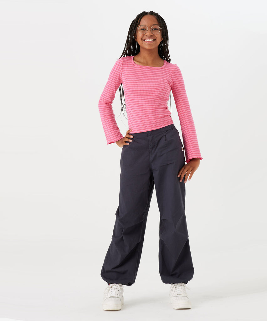 Details:  Expertly designed for both comfort and style, our Wide Parachute Pants in Galaxy Blue are the perfect addition to any wardrobe. With spacious pockets and elastic waistband and leg cuffs, these pants offer versatility and functionality. The eye-catching galaxy blue color adds a unique touch to your outfit. Order now and experience the perfect blend of fashion and practicality.  Color: Galaxy blue  Composition:  98% Cotton, 2% Elasthan  