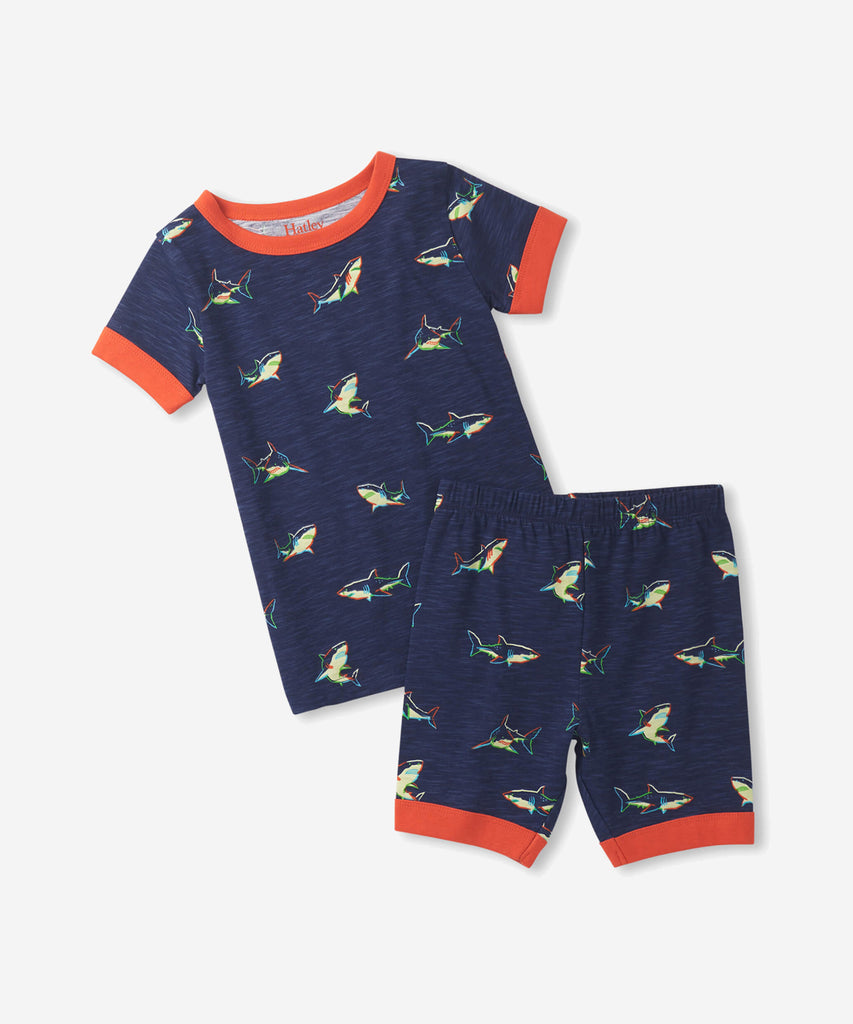 Details:  Nothing will keep them cooler on those warm summer nights than this cozy Pyjama set! Featuring short sleeves, a short pant, all over print sharks and crafted from organic cotton, these are sure to make summer sleep a breeze.  Color: Blue orange  Composition:  100% Organic Cotton  