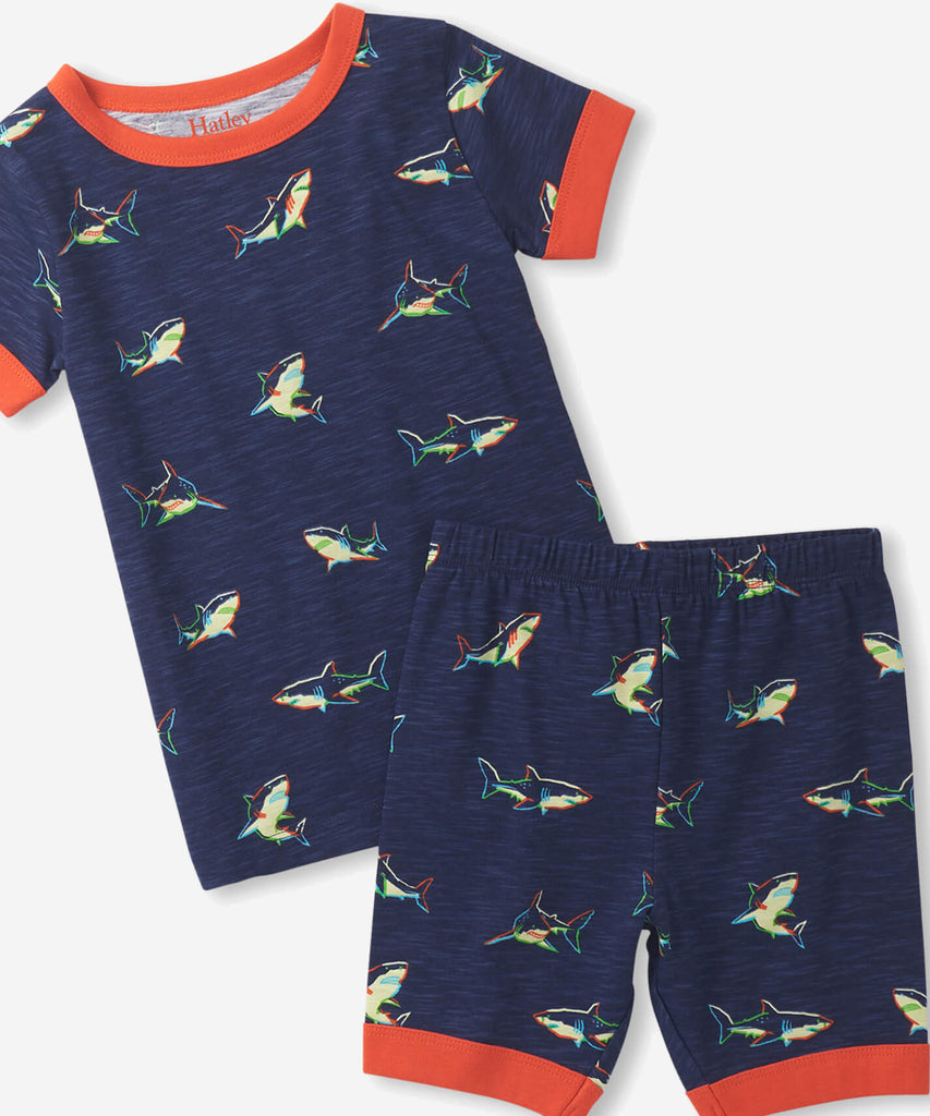 Details:  Nothing will keep them cooler on those warm summer nights than this cozy Pyjama set! Featuring short sleeves, a short pant, all over print sharks and crafted from organic cotton, these are sure to make summer sleep a breeze.  Color: Blue orange  Composition:  100% Organic Cotton  