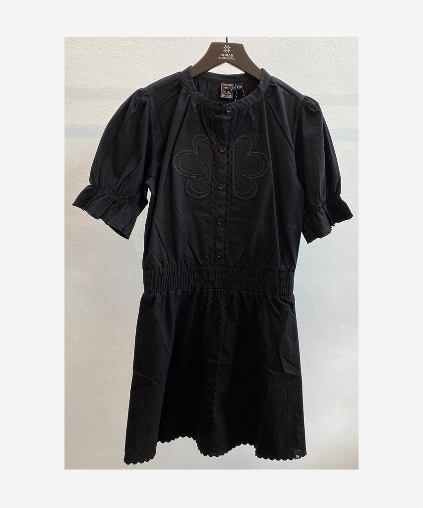 Details:  This elegant black dress features intricate embroidery and short sleeves for a classic yet stylish look. With buttons on the front, it offers a comfortable and effortless fit. Elevate your wardrobe with this versatile piece.  Color:﻿ Black  Composition: Summer 2024