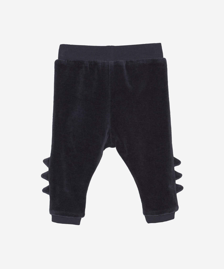 Details: These baby velour pants are the perfect choice for a stylish look. The velour fabric is soft and comfortable, while the detail on the side will make any little one stand out. Dark navy color is a perfect choice to finish up the look.  Color: Dark navy  Composition:  Organic Velour 100% Cotton  