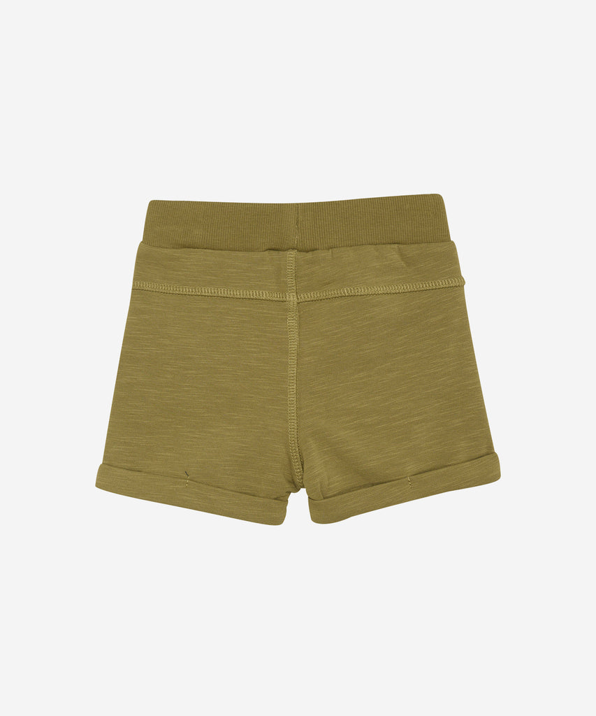 Details: These baby sweat shorts are both stylish and functional. Designed in a trendy olive green color, they feature convenient pockets and an elastic waistband for easy wear. Perfect for active little ones on the go.  Color: Olive  Composition:  95% Cotton/ 5% Elastane  