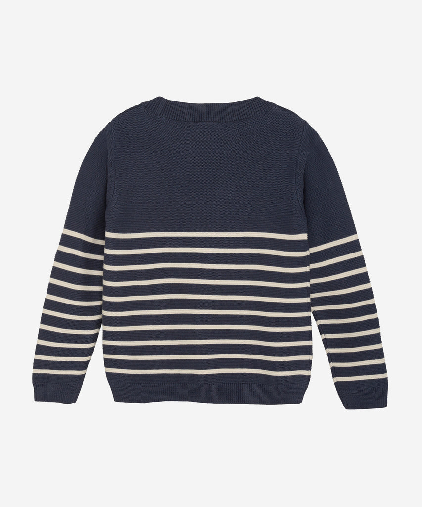 Details: Crafted with soft, knitted cotton, this pullover offers both comfort and style. The marine stripes add a classic touch, while the ribbed arm cuffs and waistband provide a snug fit. The round neckline completes the look, making this piece a must-have for any wardrobe.  Color: Blue nights  Composition:  Organic Knit 100% Cotton  