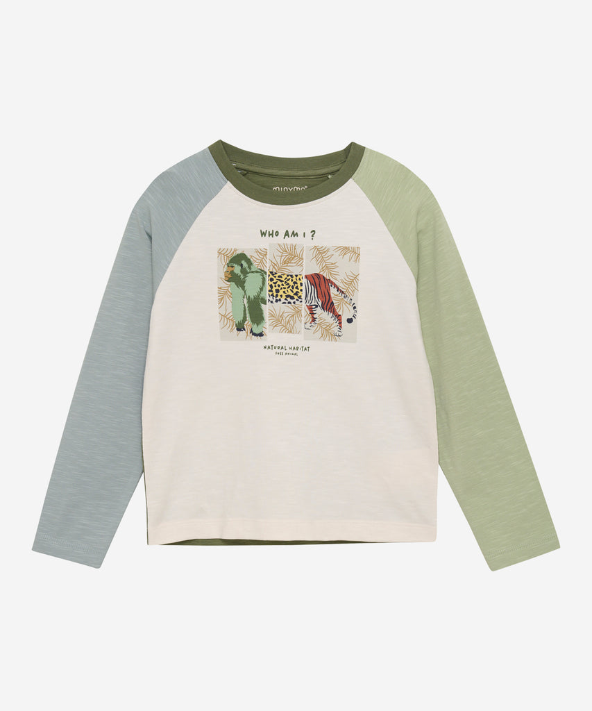 Details: Introducing our LS T-Shirt in Color Block Animals Eggnog. This long sleeve tee features a playful animal print on the front with a unique color block design in shades of olive, eggnog, and grey blue. Complete with a classic round neckline, this shirt is both stylish and comfortable.  Color: Eggnog  Composition: Organic Singlejersey-slub yarn 95% Cotton/ 5% Elastane  