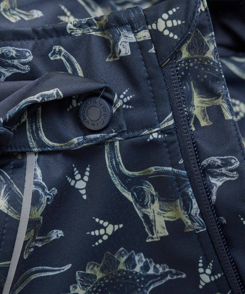 Details: Stay stylish and safe with our Softshell Spring Jacket AOP Dinos Blue Nights. This boys jacket features a hood and an all over dino print. With added reflectors for visibility, your little one can explore fearlessly while staying visible. Expertly crafted for comfort and durability.Lining, zip closure and pockets.  Color: Blue night  Composition: Softshell 8.000mm/3000 g/m2 100% Polyester 
