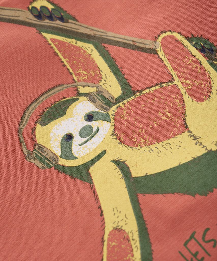 Details: Experience comfort and style with our T-Shirt Sloth Argon. Made with a round neckline and short sleeves, this shirt features a playful sloth print on the front. Perfect for everyday wear, this t-shirt will add a touch of fun to your wardrobe.  Color: Argon  Composition:  Organic Single Jersey 95% Cotton/ 5% Elastane  