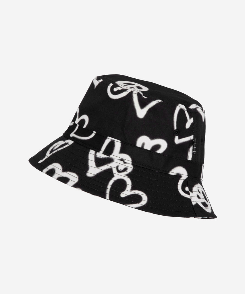 etails: Siks is an black bucket hat in Hearts, an all over print. The print looks like someone has spray painted tags of Hearts.  Sizing:  Age: 5-9 Age: 10-16 Color: Black white    Composition:  100% Cotton  