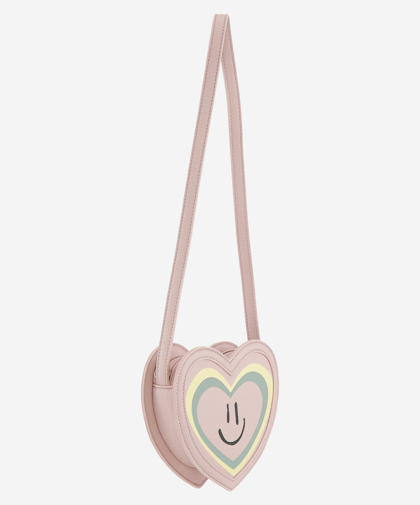 Details: Petal blush heart shaped cross body bag with zipper closure and smiley print.  Color: Petal blush  Composition:  100% Polyurethane 
