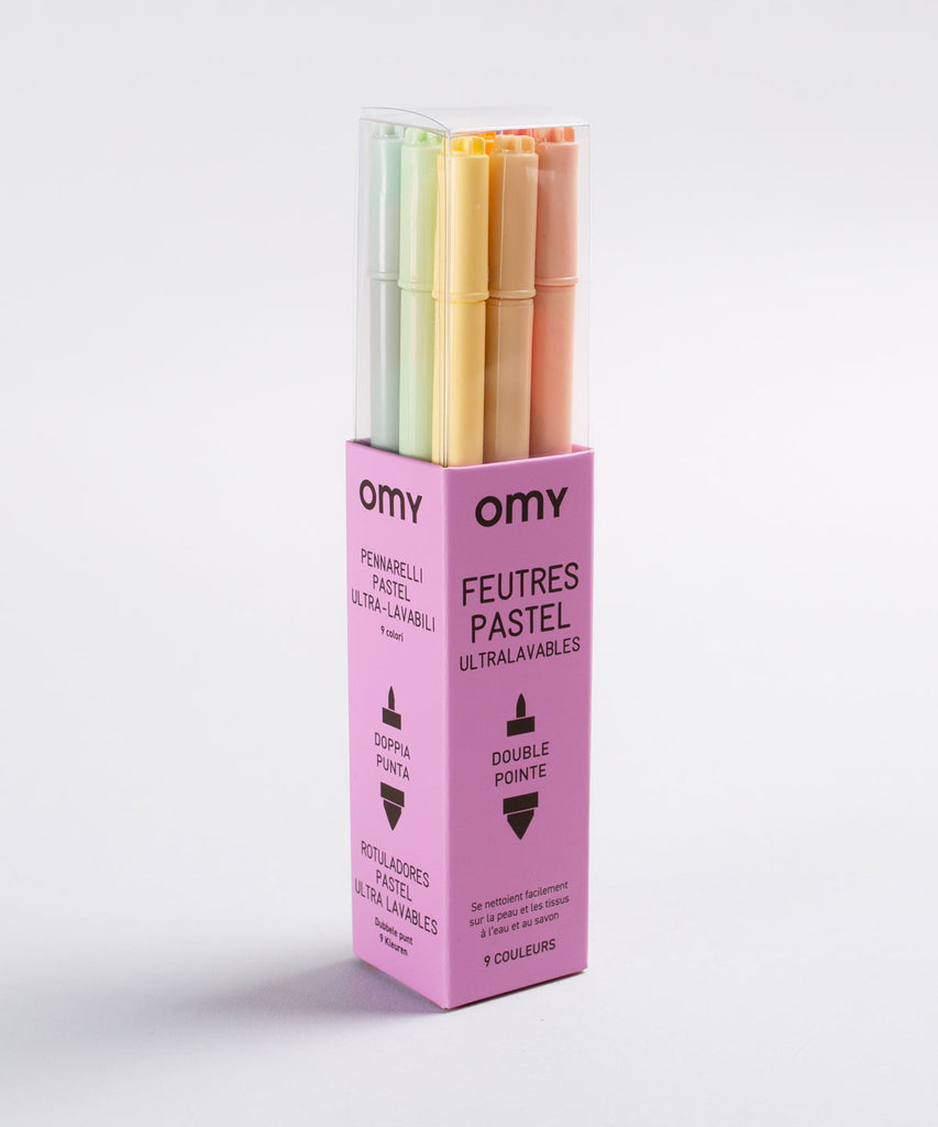 OMY   Assortment of 9 pastel markers. Trendy markers with soft and prominent colors! 9 unreleased colors that spark new nuances through coloring and drawing. Conveniently, the box transforms into an at home crayon holder! Made in Italy  Content 9 ultra washable pastel felt pens Made in Italy and designed in France by OMY