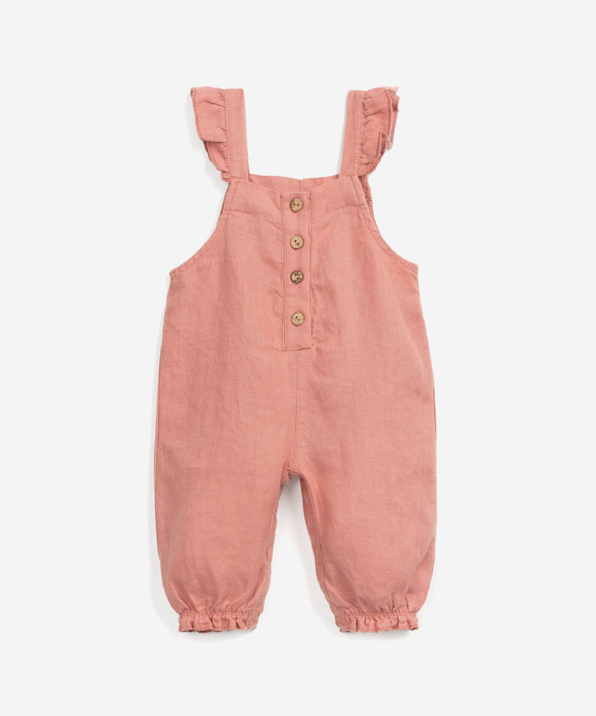 Details: This jumpsuit is made of woven linen, Coral colour. This model has a straight neck, a frill on the straps, an opening on the front with coconut buttons, elastic leg hems, and a crotch opening with nickel-free metal clips (crotch opening up to size 18M).  Colour: Coral  Composition:  100.0% Linen  