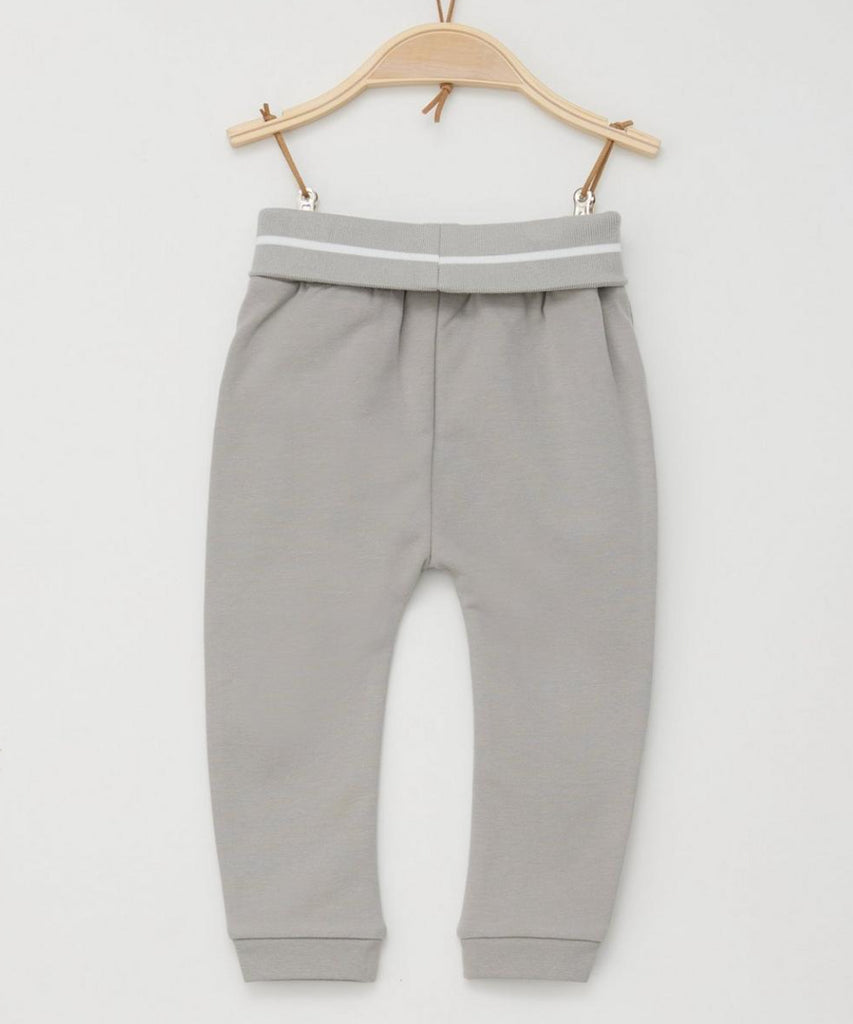 <strong>Details:</strong>&nbsp;Baby Jogg Pants in light grey, designed for ultimate comfort with elastic waistband and convenient pockets. Made with soft, breathable fabric perfect for active little ones. Keep your baby stylish and comfortable all day long.<br><strong>Color:</strong><span> Light grey&nbsp;</span><br><strong>Composition:</strong><span>&nbsp; 095%CO 005%EL &nbsp;</span>