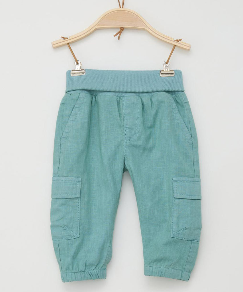 <strong>Details:</strong> Expertly crafted for your little one, our Baby Woven Cargo Pants in Dusty Mint provide both style and comfort. The elastic waistband allows for easy movement, while the convenient pockets add functionality. Elevate your baby's wardrobe with these trendy and practical pants.&nbsp;<br><strong>Color:</strong><span> Dusty mint&nbsp;<br></span><span></span><strong>Composition:</strong><span>&nbsp; 095%CO 005%EL &nbsp;</span>