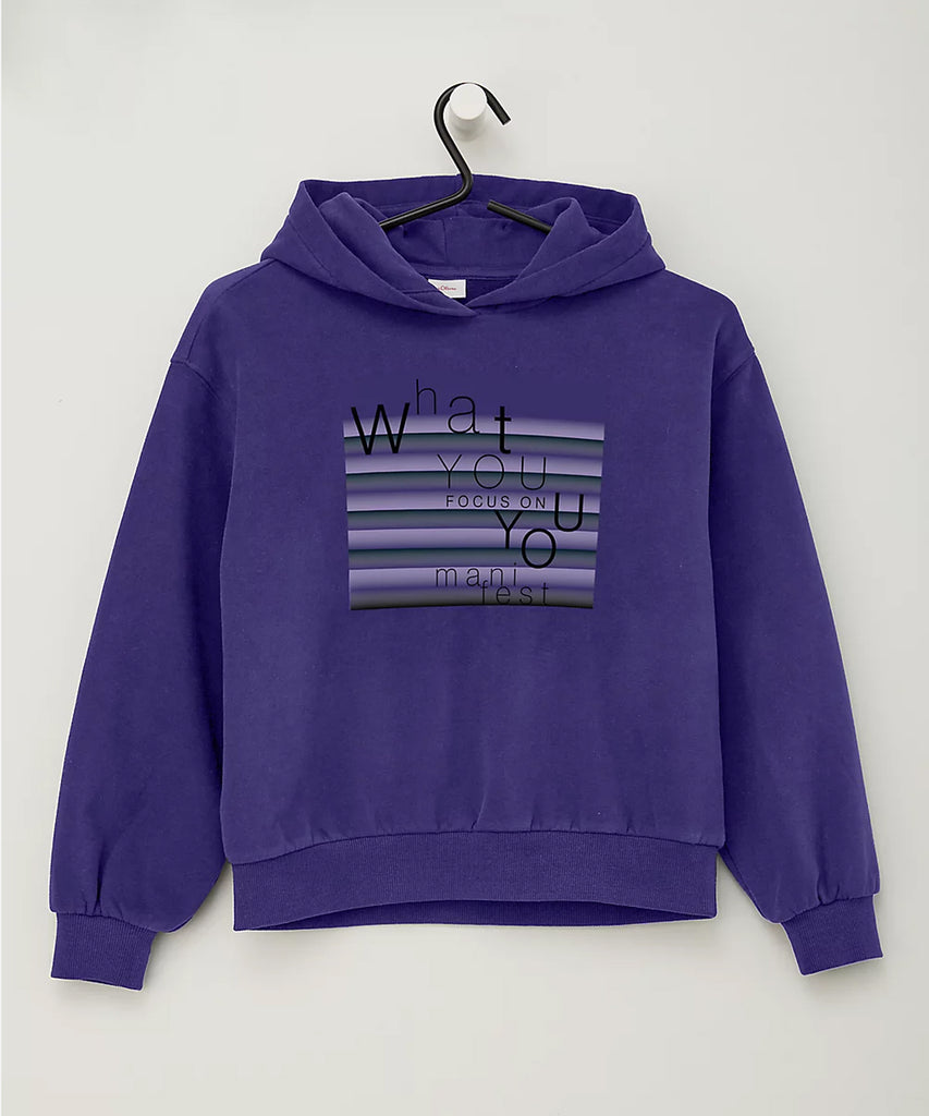 Details:  Our hooded sweater provides comfort and style with its hooded design and ribbed arm cuffs and waistband, perfect for teen girls. Featuring an eye-catching Focus print on the front, this stylish sweater is sure to turn heads.  Color: Purple  Composition: 075%CO 025%PES  