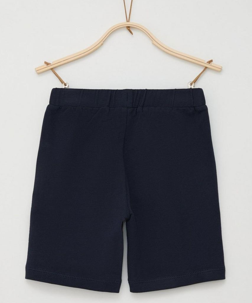 <strong data-mce-fragment="1">Details: </strong>These navy blue kids' jogg shorts are the perfect addition to any active child's wardrobe. With a comfortable elastic waistband and convenient pockets, these shorts are perfect for sports, playtime, or just lounging around. The stretchy fabric ensures a perfect fit for growing kids.<br><strong></strong><strong>Color:</strong> Navy blue&nbsp;<br><strong>Composition:&nbsp;</strong> 100%CO &nbsp;