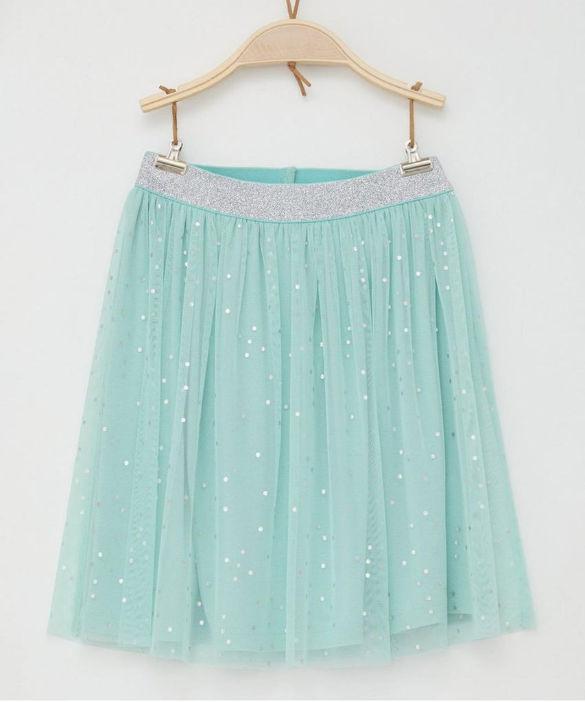Details: This mint green tulle skirt is perfect for girls who love a touch of glitter in their outfits. The elastic waistband ensures a comfortable fit, making it great for all-day wear. Complete with shimmering dots, this skirt adds a playful and stylish touch to any look. Enhance your child's wardrobe with this must-have piece.  Color: Mint green  Composition:  100%PES 