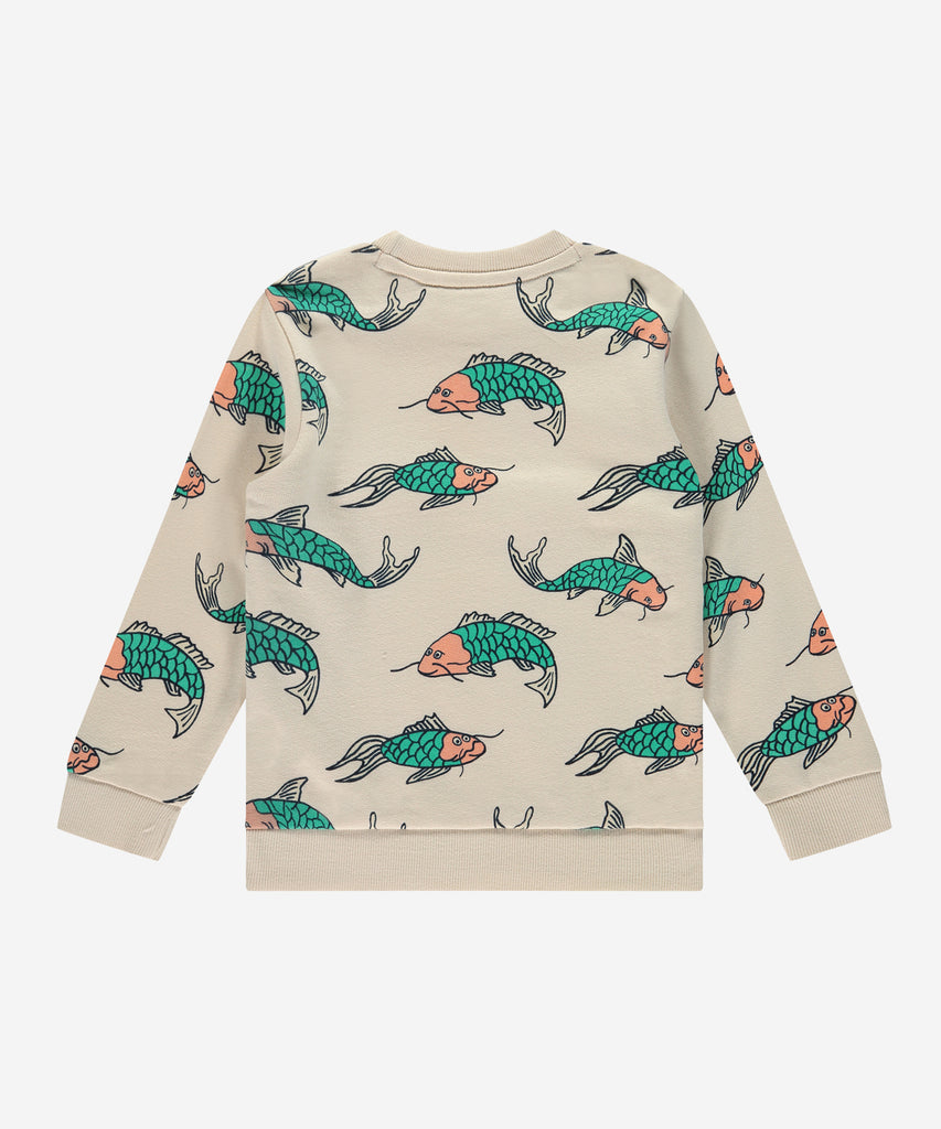 Details: This long sleeve sweatshirt features a unique all over print of fish, adding a fun and playful touch to any outfit. Its comfortable design is perfect for colder weather, making it a versatile addition to any wardrobe. Stay warm and stylish with this AOP Fish Cream sweatshirt. Ribbed arm cuffs and waistband. Up to size 92, easy opening with 2 push buttons on the side of the collar. Round Neckline.   Color: Cream  Composition: 100% BCI cotton  