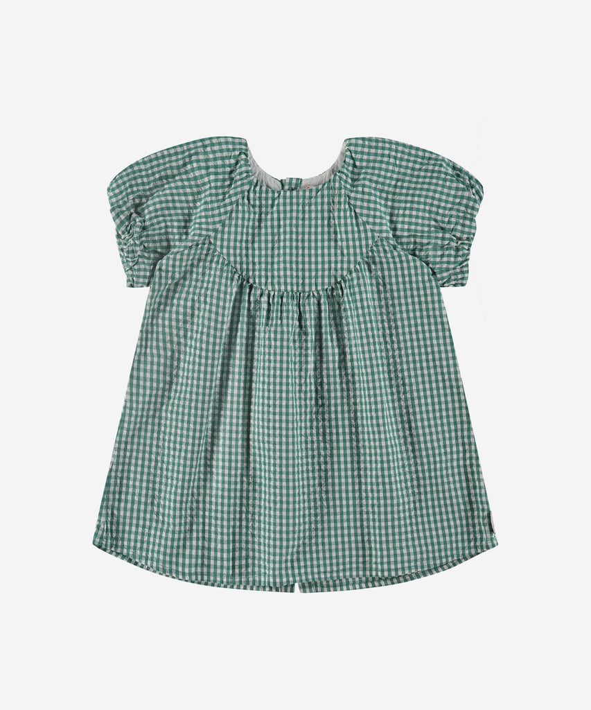 Details: Crafted from high-quality woven fabric, this Vichy dress features a classic round neckline and a stunning emerald green color. The button closure on the back adds a touch of elegance to this timeless piece. Perfect for any occasion, this dress is a must-have addition to your wardrobe.  Color: Emerald  Composition: 100% cotton 