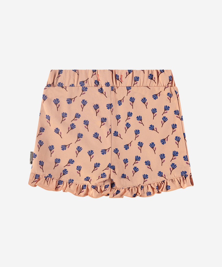 Details: Introducing our Skirt with Short, featuring an elastic waistband for comfort and convenience. Its salmon color and all over print of flowers add a touch of femininity to any outfit. Embrace effortless style with this versatile and fashionable skirt.   Color: Salmon  Composition: 95% BCI cotton/ 5% elasthane  