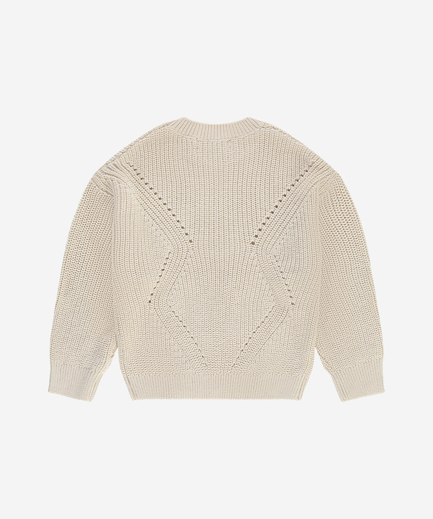 Details: This knit rib pullover in stone white offers a classic and versatile addition to your wardrobe. The round neckline and soft, comfortable fabric make it a perfect choice for any occasion. Elevate your style with a timeless and elegant look.&nbsp;&nbsp;
Color: Stone&nbsp;&nbsp;
Composition: 100% cotton&nbsp;