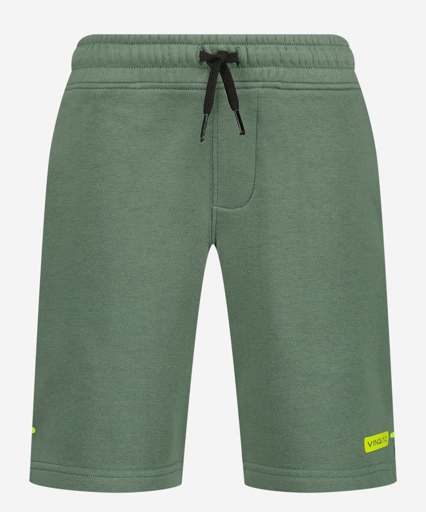 Details:  Expertly designed for maximum comfort and style, our Basic Jogg Shorts in Biome Green are the perfect addition to any wardrobe. Crafted with an elastic waistband and convenient pockets, these sweat shorts offer both functionality and ease. Stay comfortable and on-trend with our versatile green shorts.  Color:  Green  Composition:  80% Cotton / 20% Polyester  