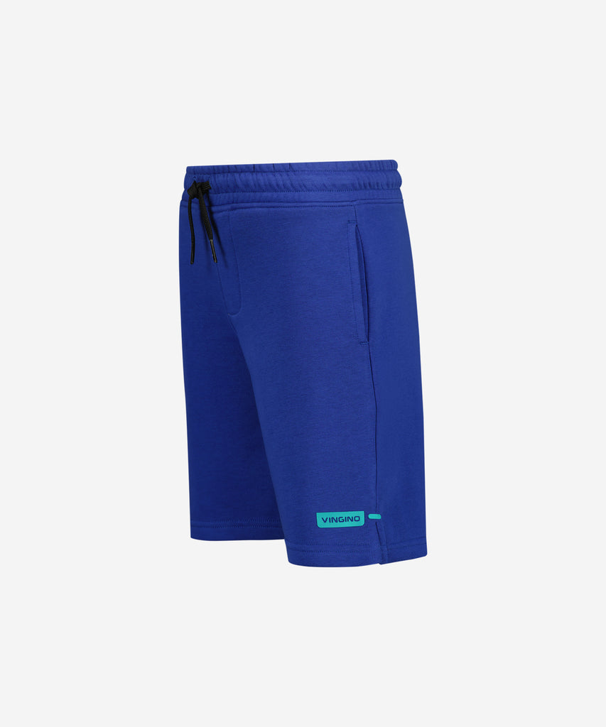 Details:  Expertly designed for maximum comfort and style, our Basic Jogg Shorts in Web blue are the perfect addition to any wardrobe. Crafted with an elastic waistband and convenient pockets, these sweat shorts offer both functionality and ease. Stay comfortable and on-trend with our versatile green shorts.  Color:  Blue  Composition:  80% Cotton / 20% Polyester  