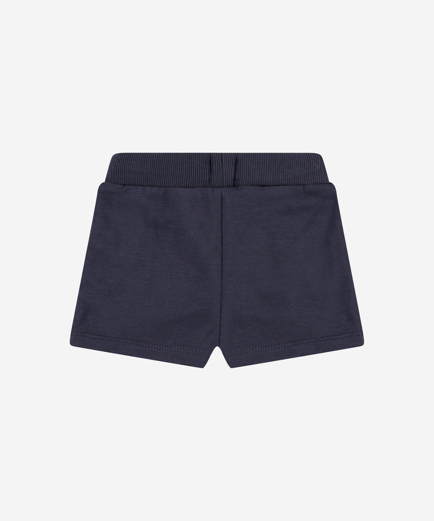 Details: Soft shorts with elastic waistband, pockets and trim on the side.  Color: Dark blue  Composition: 95% cotton/5% elasthan  